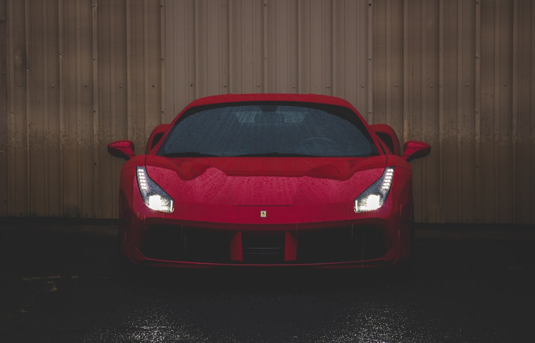 Red Ferrari in garage
