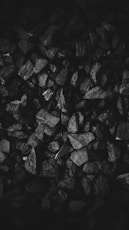 grayscale photo of stone