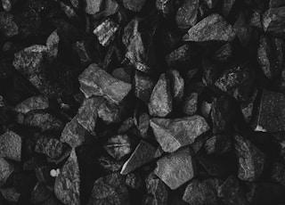 grayscale photo of stone