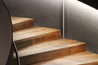 Custom wooden staircases with smooth finish in a modern home.
