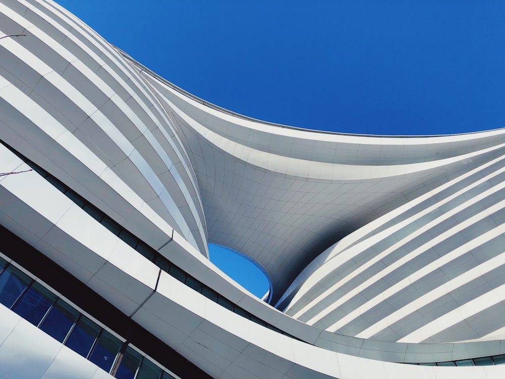 low angle photography of building under blue sky