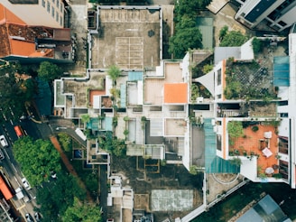 top-down drone view of urban rooftops for real estate and property inspection analysis