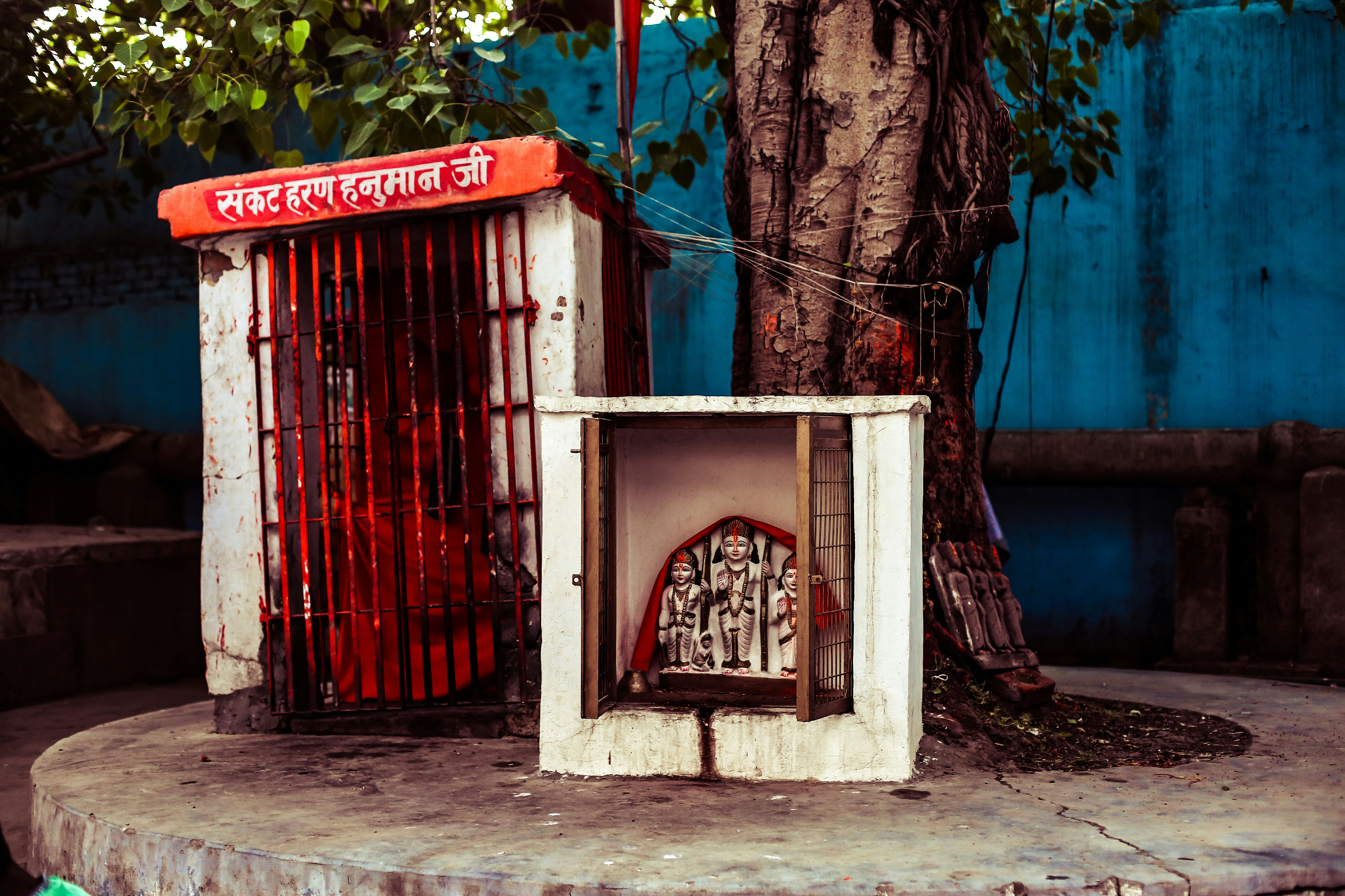 white altar beside tree