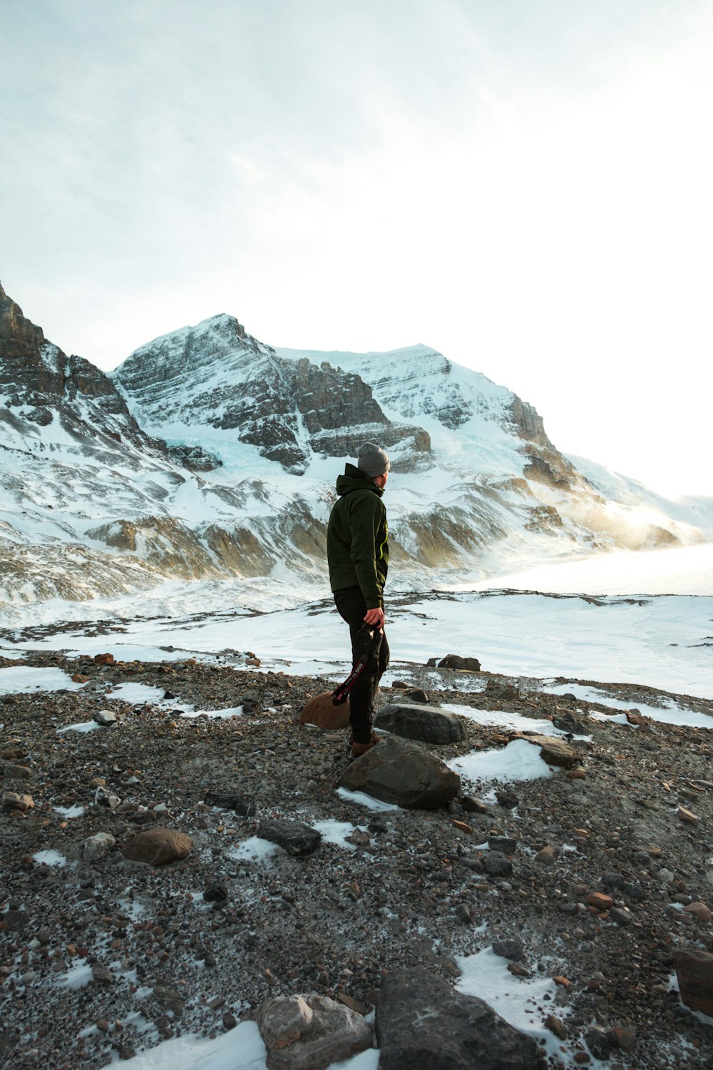 man standing near mountain