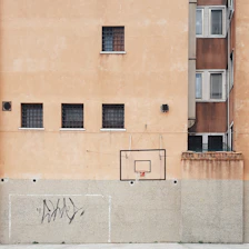 architectural photography of brown concrete building