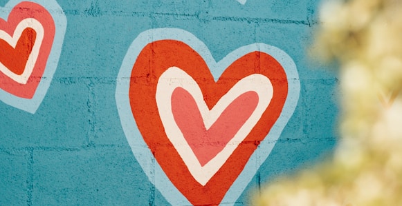 selective photo of red and white hearts graffiti