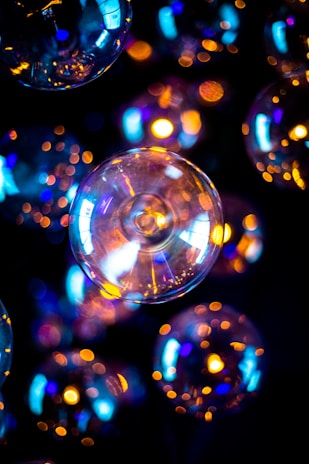 Colorful aura artwork glowing softly against a dark background