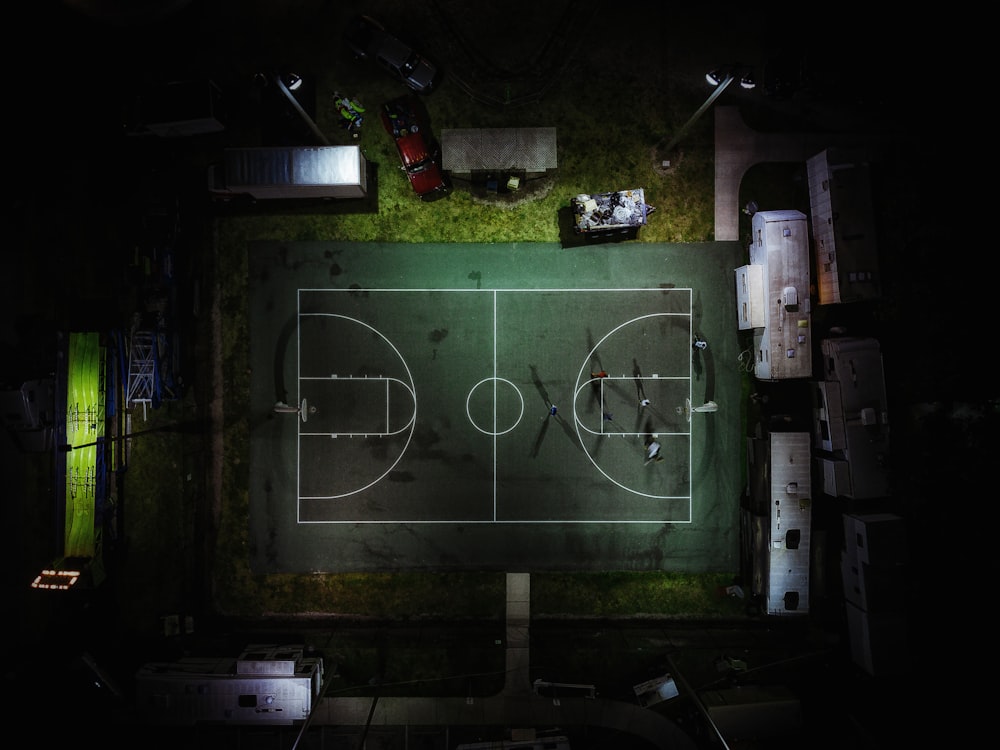 aerial photography of green basketball court