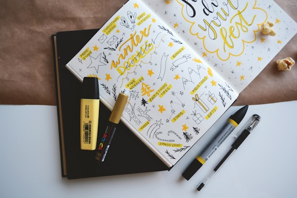 coloring book and four markers