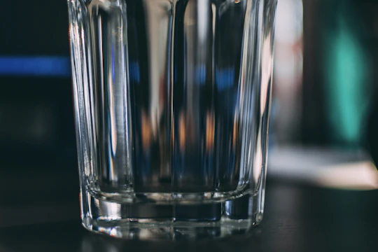 Close-up of the semi-transparent glassmorphism search bar with blurred background.