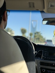 A happy passenger enjoying a smooth ride through downtown Los Angeles.