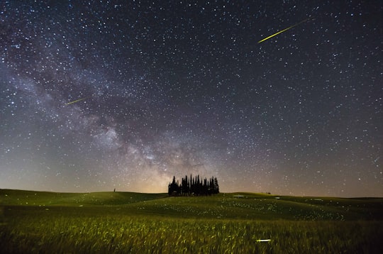 shooting star and milky way at night in San Quirico d'Orcia Italy