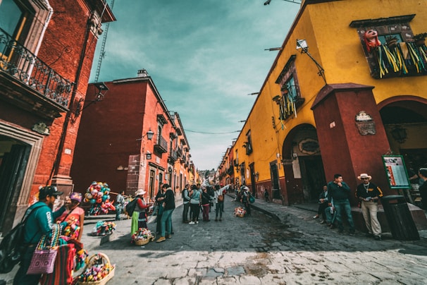 A vibrant street scene showcasing traditional Mexican architecture.