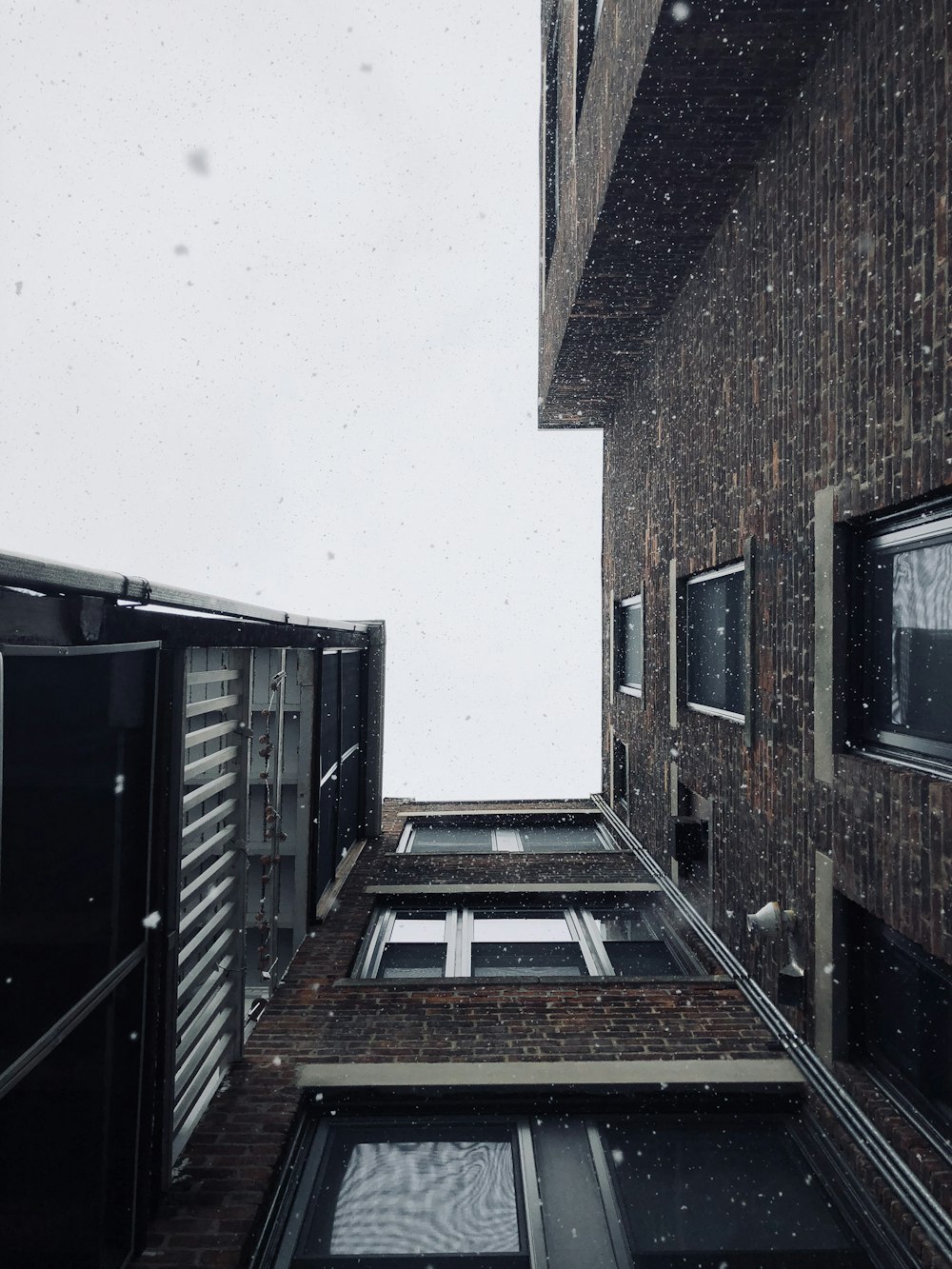 low angle photography of brown concrete building