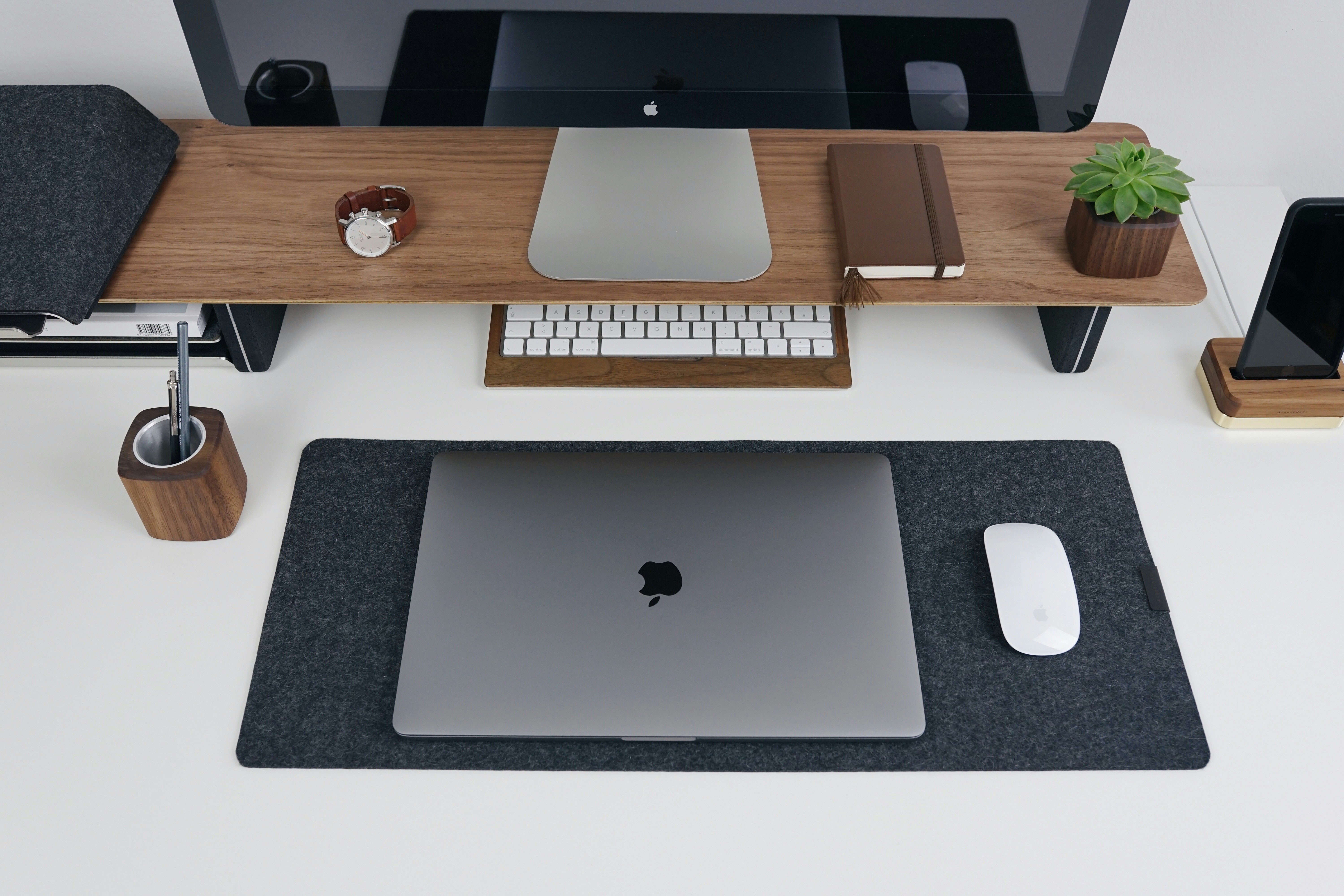 Silver MacBook on minimal desk