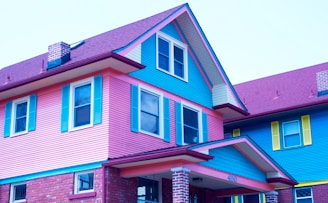 A vibrant house with newly installed siding.