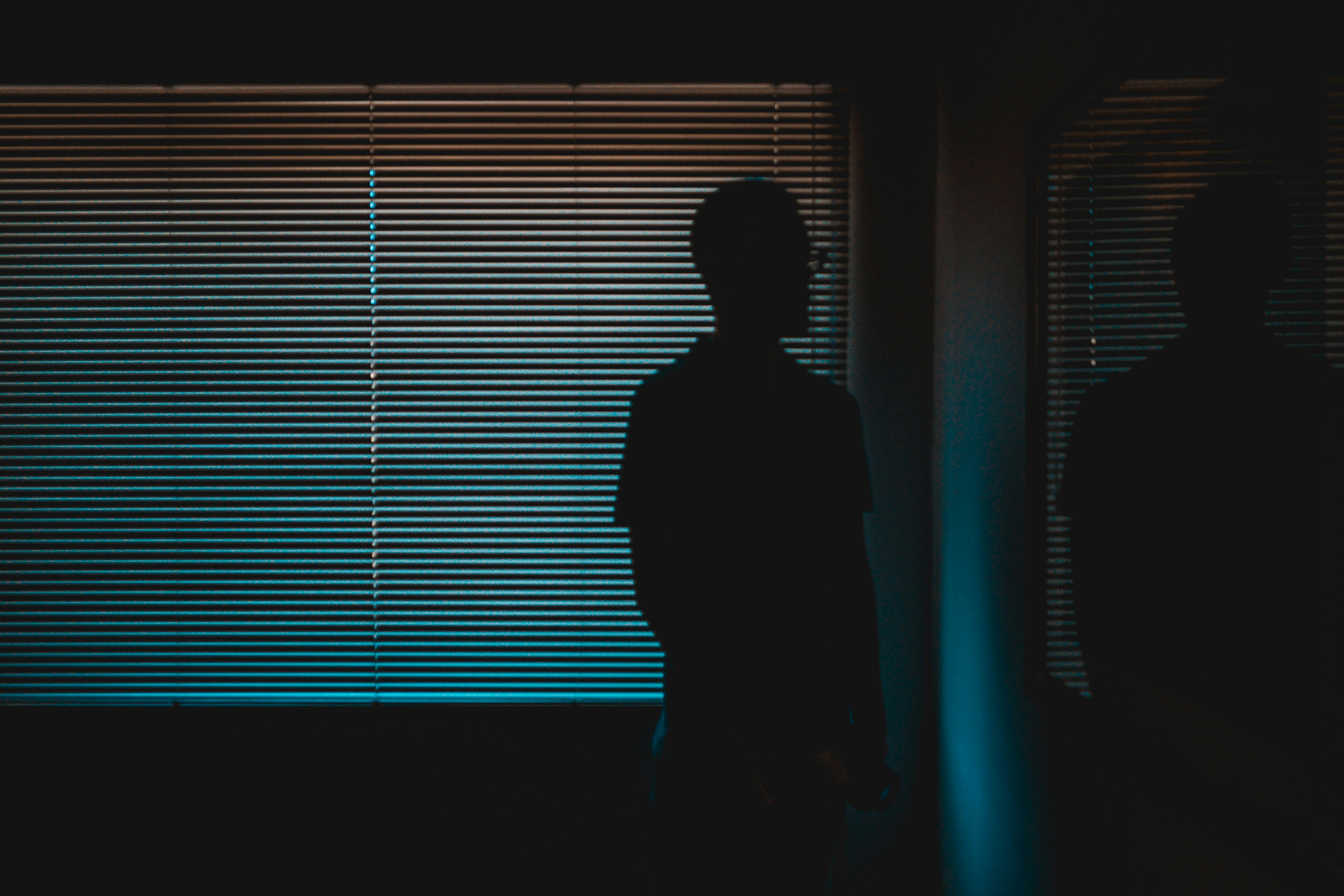 We took a little photography trip to a local museum, the models bailed on us; so we decided to become the models ourselves. It was mid-day so we were forced to stay inside because the light was too harsh, we found this empty room inside of the museum, it was dark and and perfect for a silhouette photo of my friend with a reflection off the room’s window, we got kicked out of the room, but it was worth it.