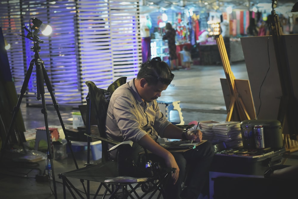 man sitting on chair