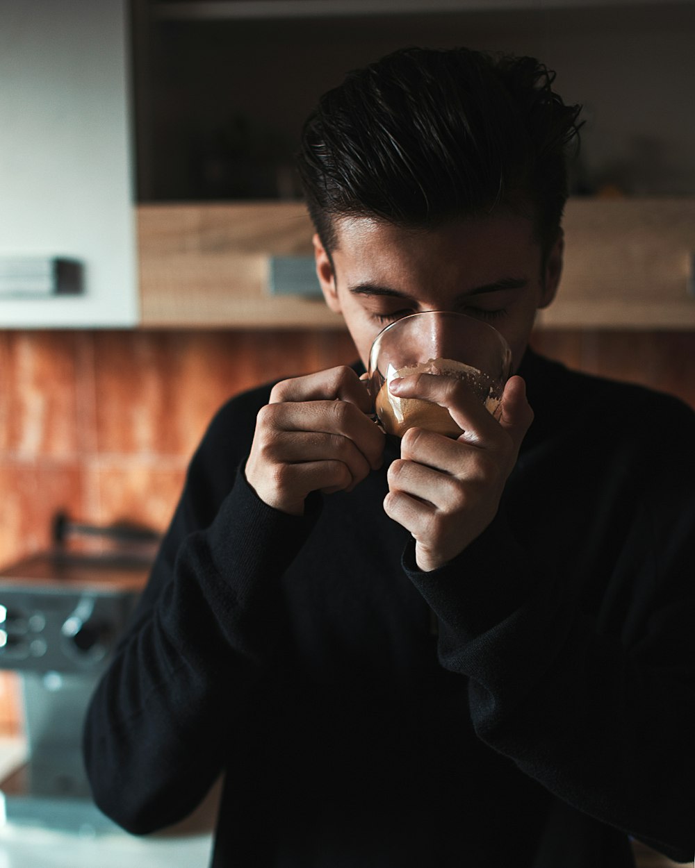 man drinking coffee