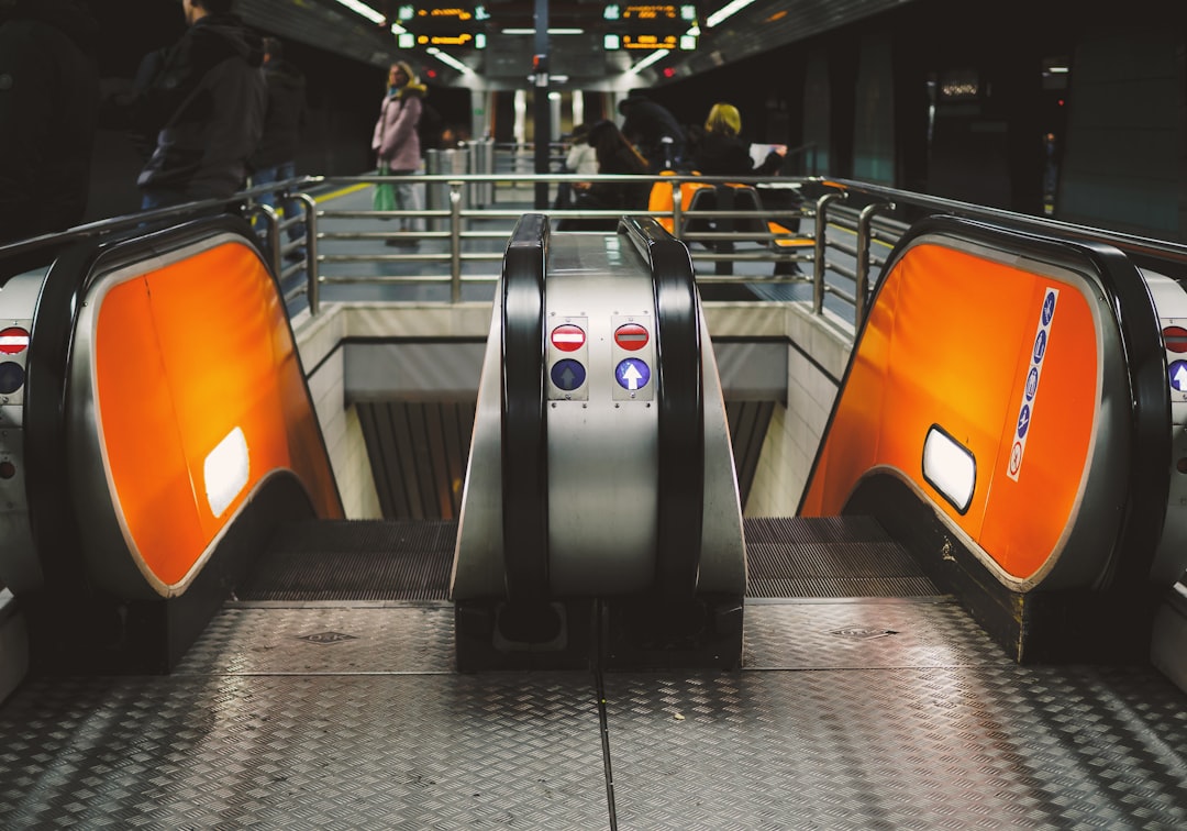 escalator on train station, I’m going deeper Underground