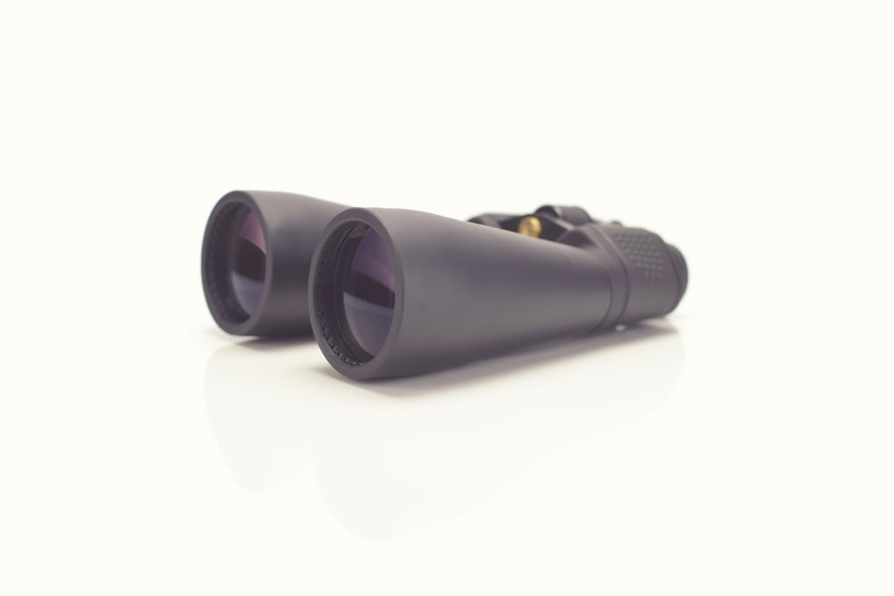 black binoculars with white background