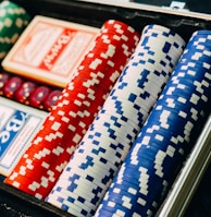 closeup photography of poker chip set