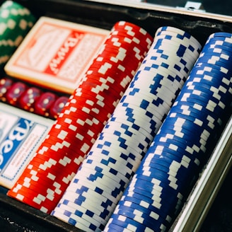 closeup photography of poker chip set