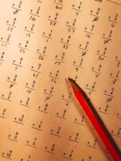 A screenshot of an interactive math problem being solved step-by-step in a Math Champs class.