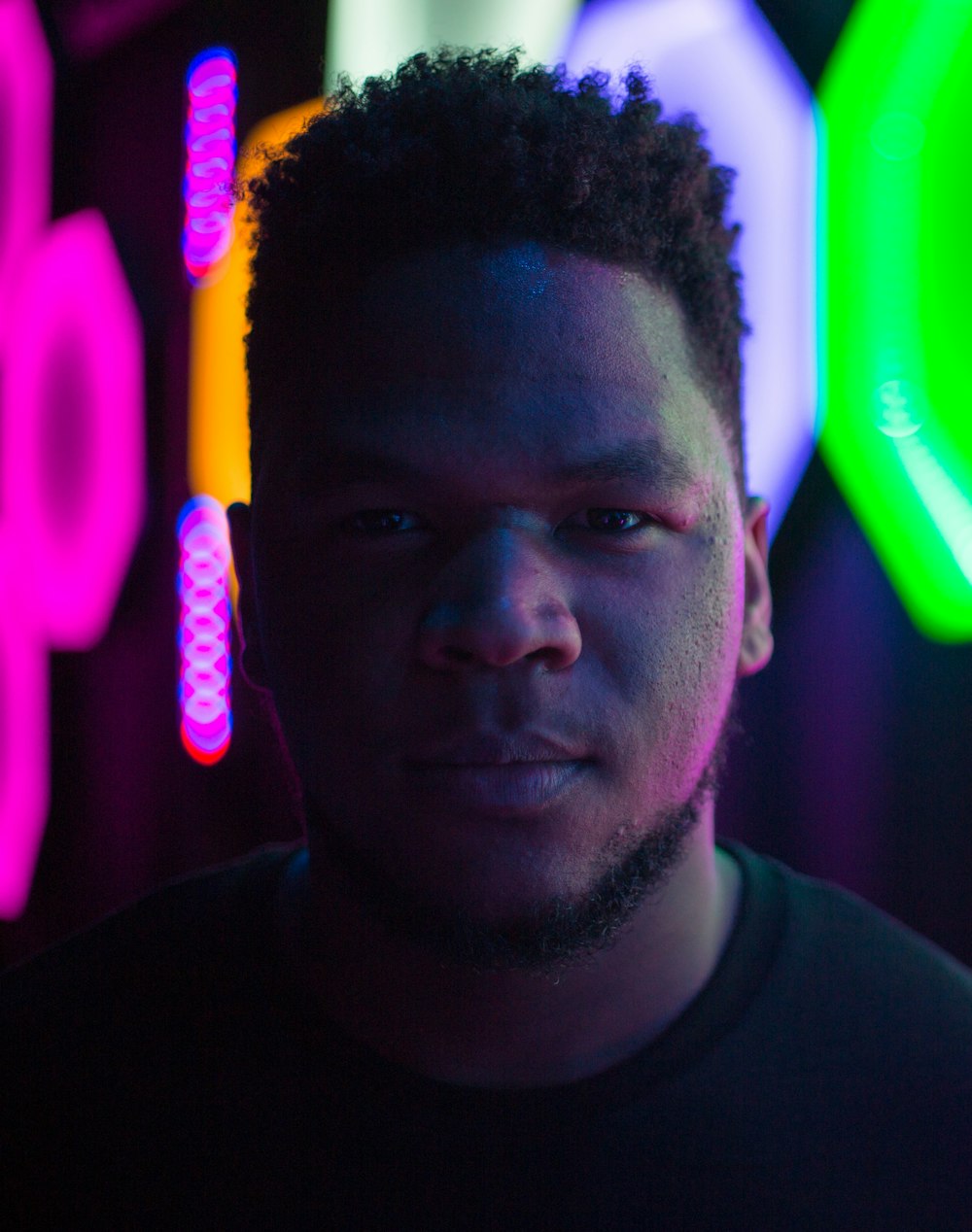 macro shot photography of man in black shirt