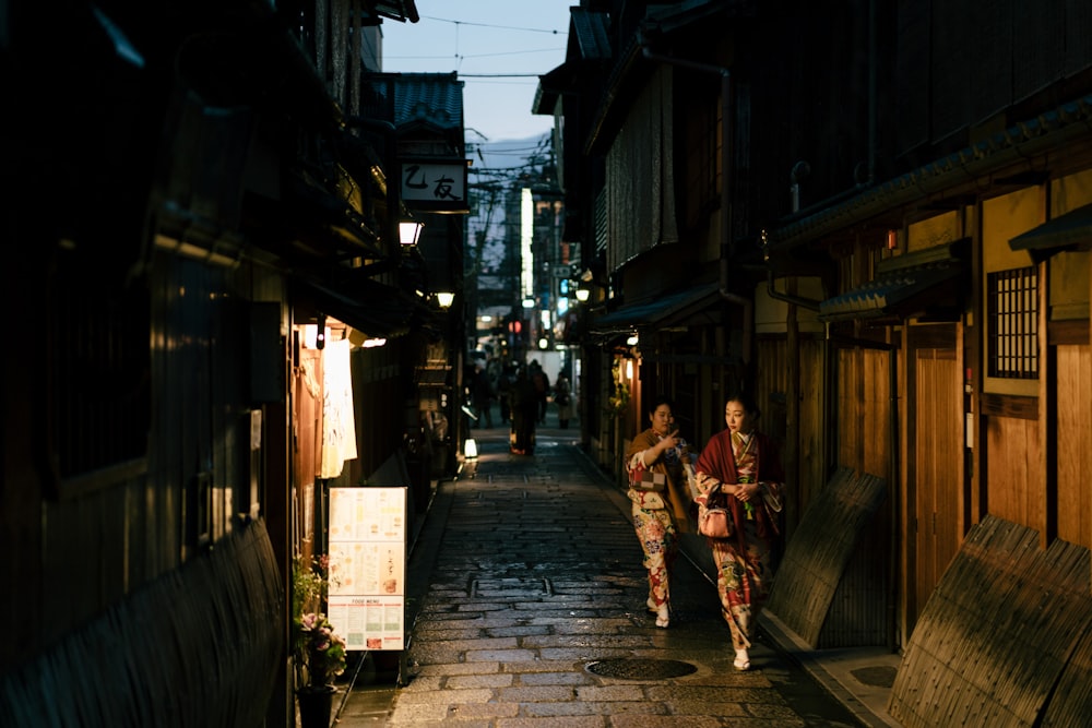 women walking on street