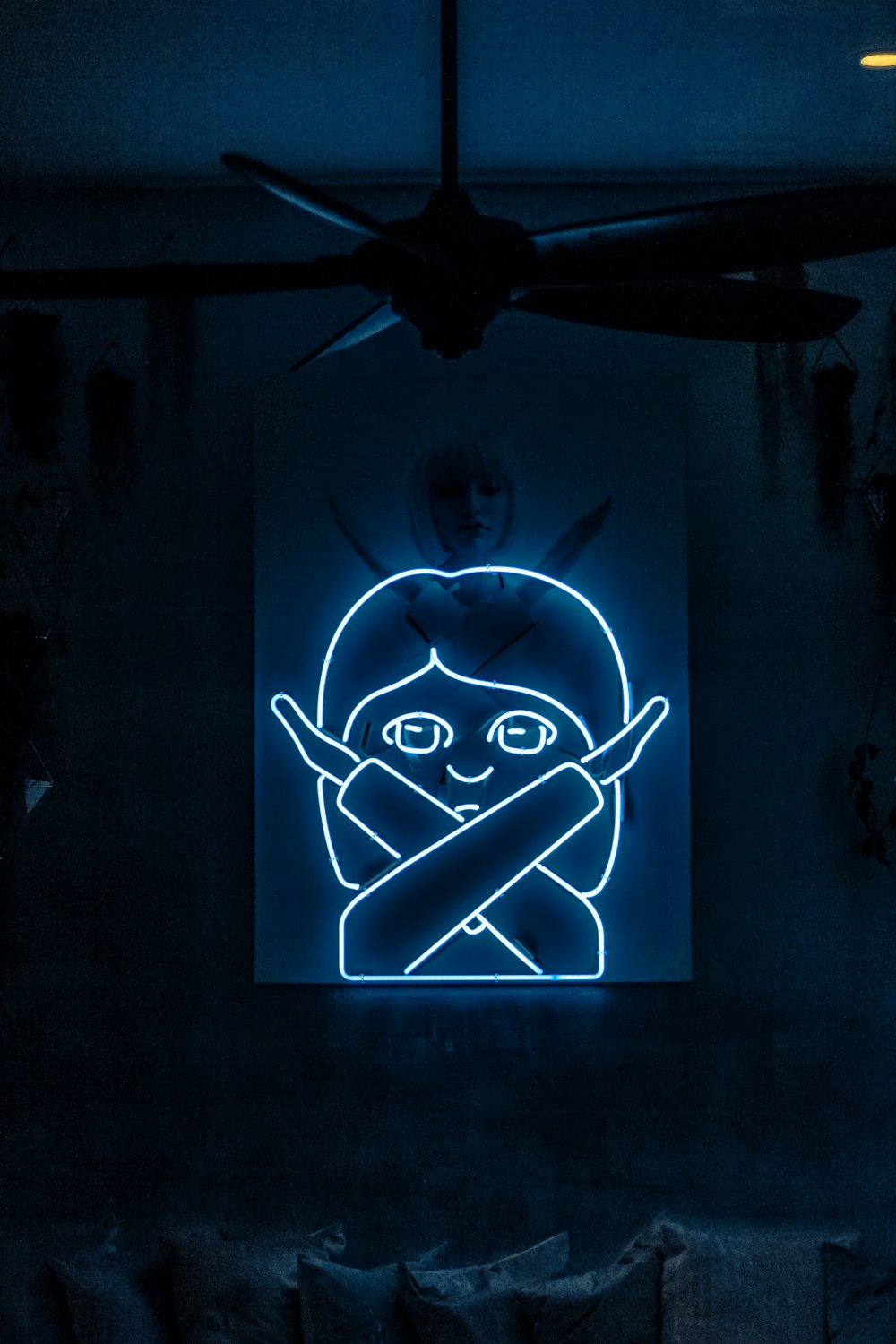 neon signage of woman crossing her both arms