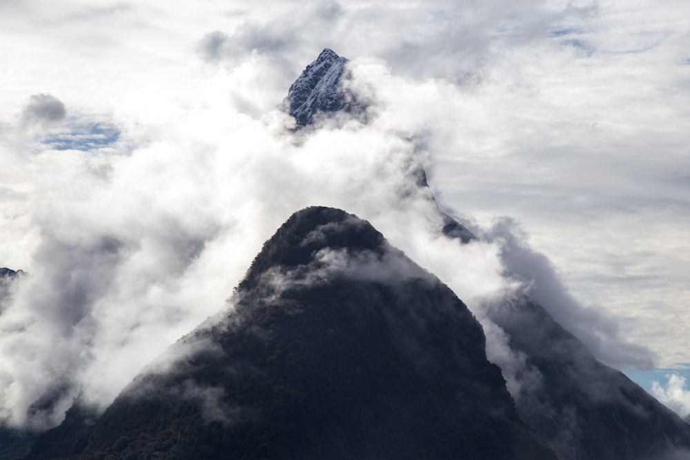 aerial photography of mountain covered with fogs