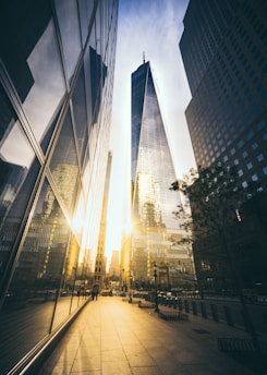 low-angle street photography of state of the art high-rise building