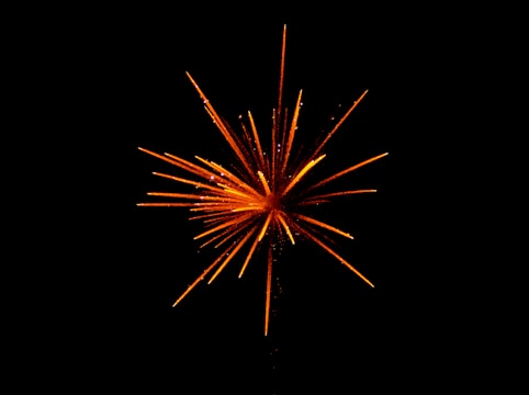 red and orange fireworks in black background