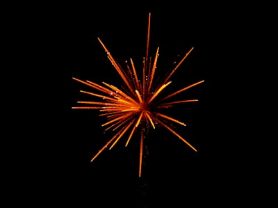 red and orange fireworks in black background firework zoom background