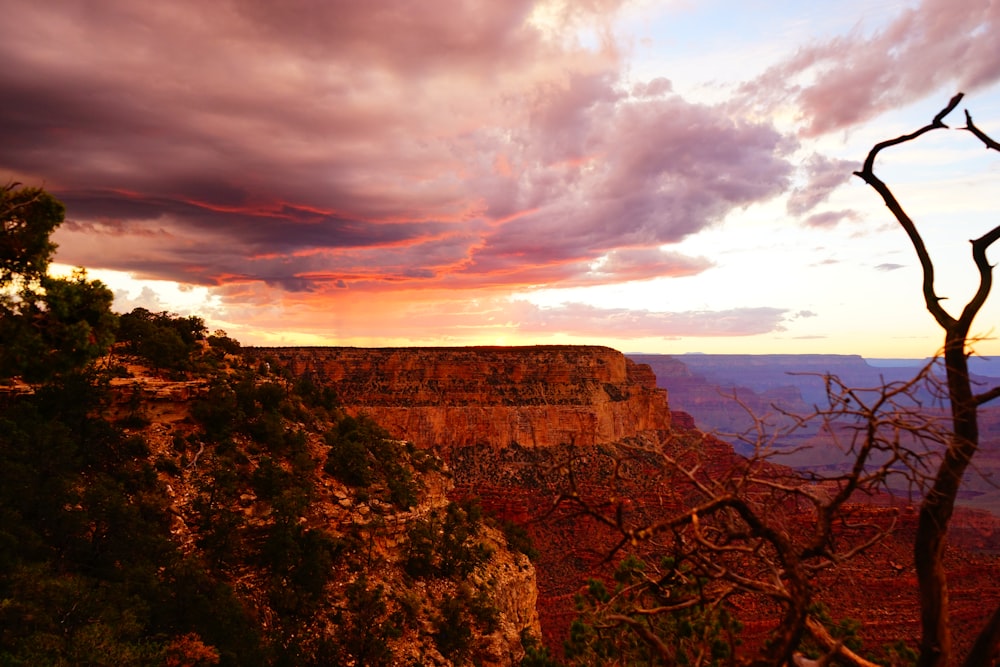 a view of a sunset over a canyon