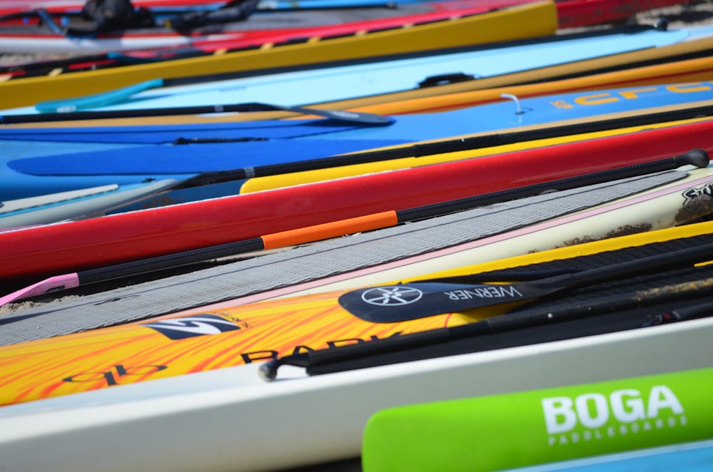 a row of surfboards sitting next to each other