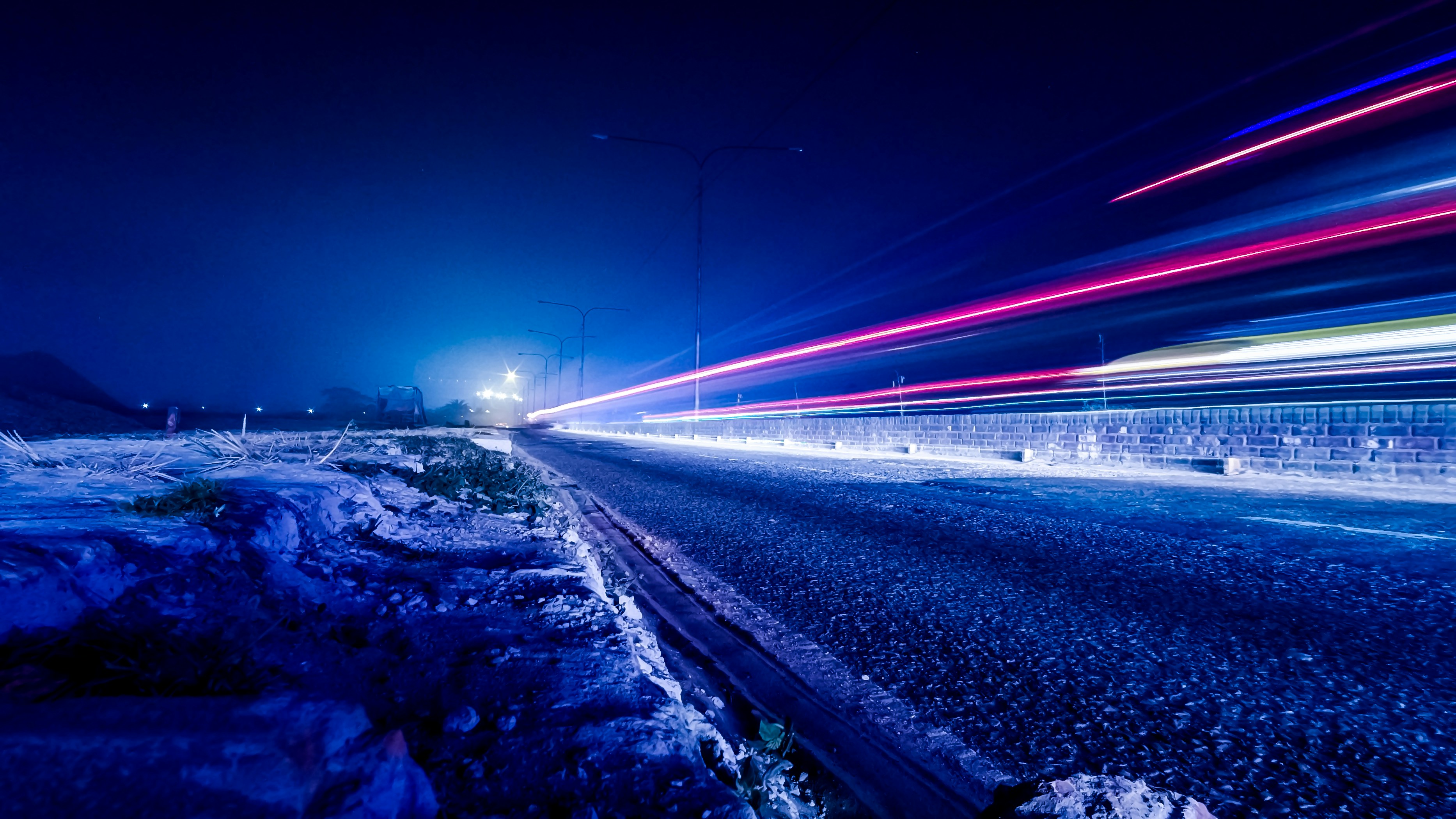 time lapse photography of vehicle light during nighttime