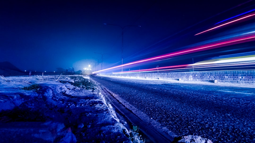time lapse photography of vehicle light during nighttime
