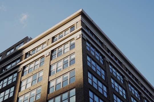 low angle photo of gray concrete building in Center City United States