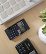 black digital device on table