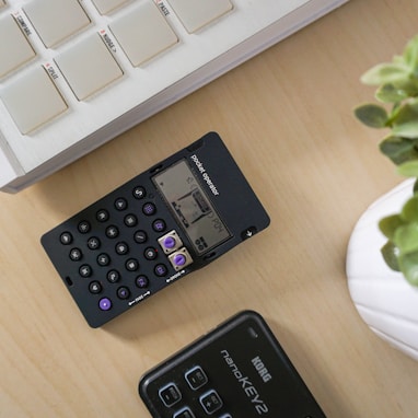 black digital device on table