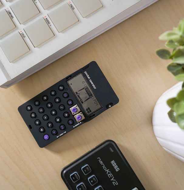 black digital device on table