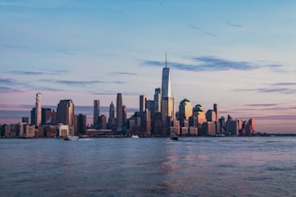 buildings near body of water landscape photography