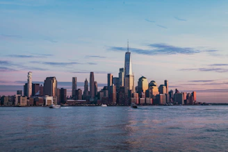 buildings near body of water landscape photography