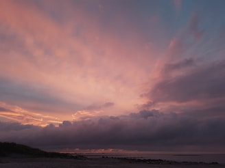 A scenic view of a travel destination with a sunset.
