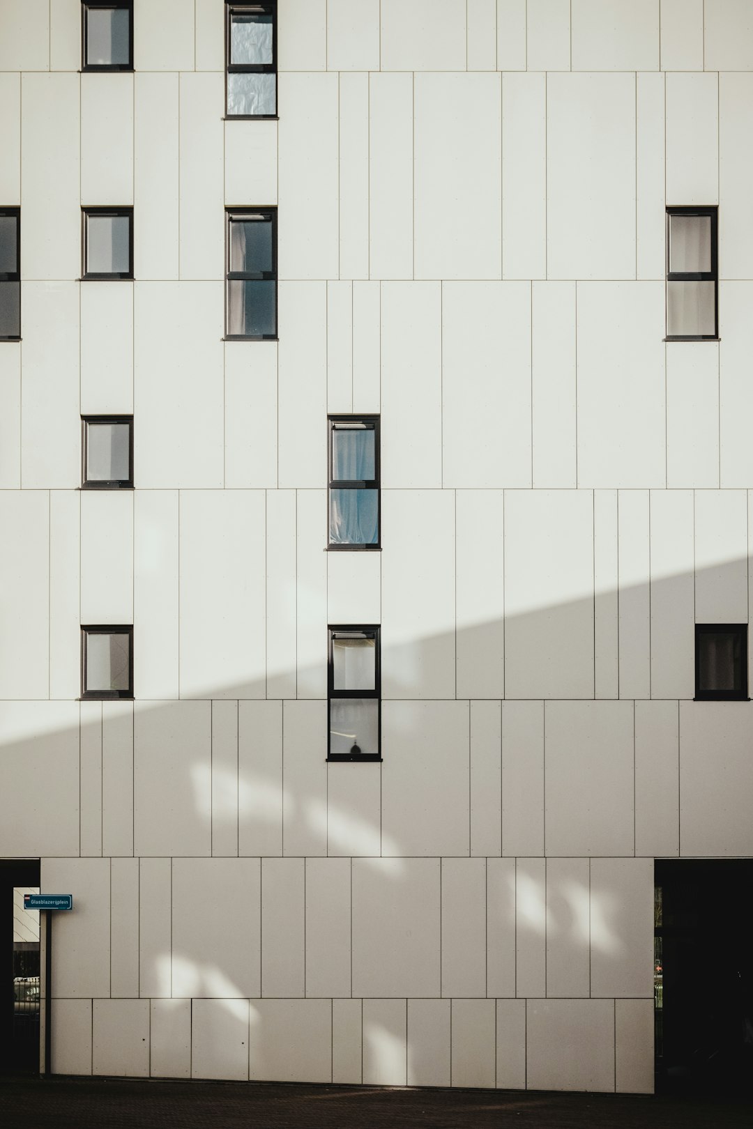 photo of white concrete building during daytime