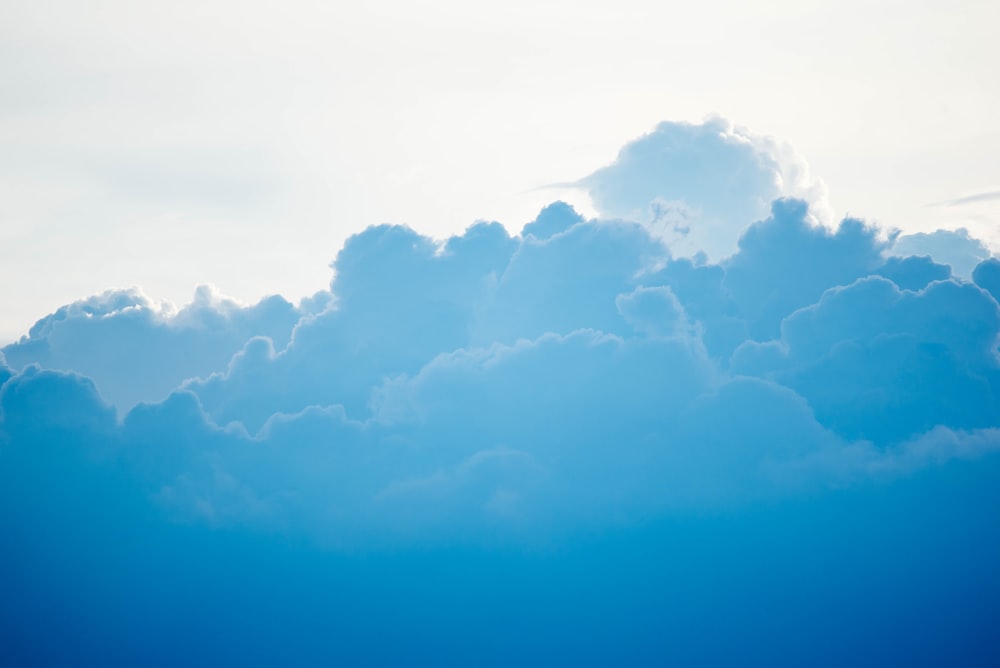 Blue clouds under white sky photo – Free Cloud Image on Unsplash