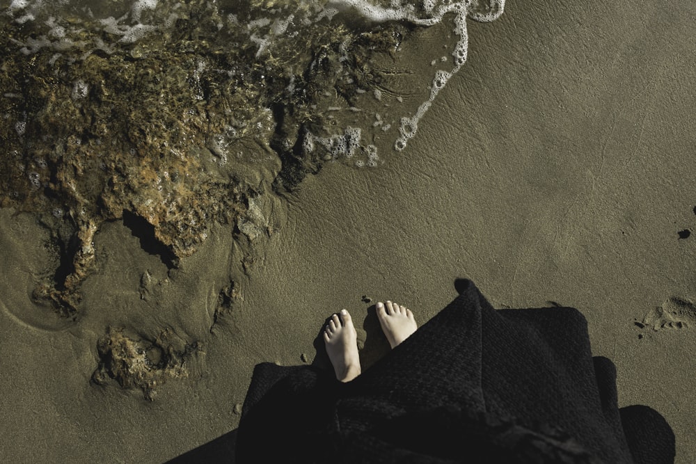 person standing on seashore