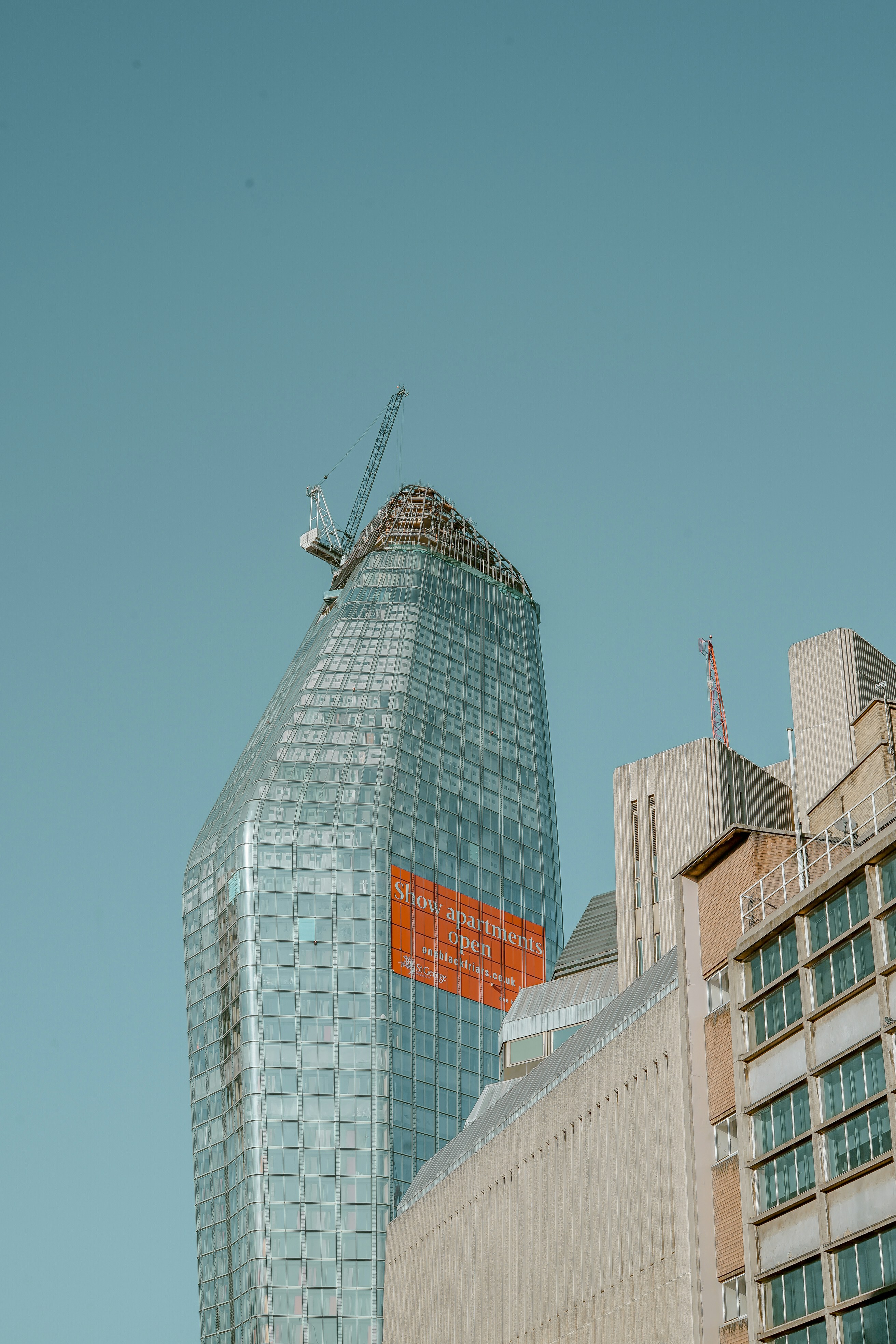 high-rise building under blue sky